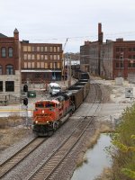 With the rear of the train still stretched out across the Mississippi, E-PCTBTM rolls through Burlington